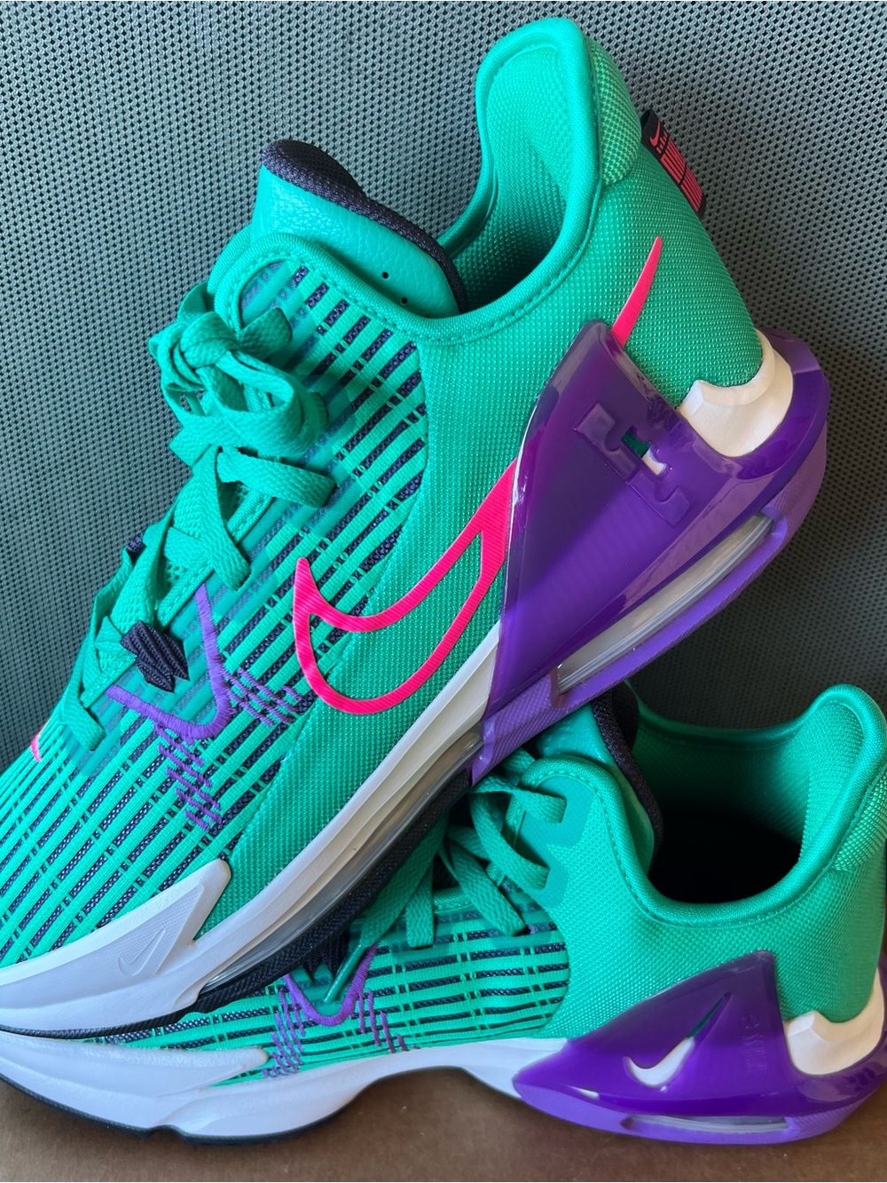 Nike Teal Sneakers with Pink Swoosh and Purple Heel